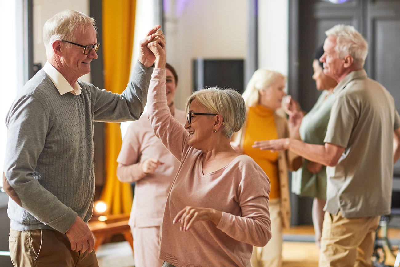 Seniors-dancing-together-physical-activity-and social-interaction-against-Alzheimers-dementia